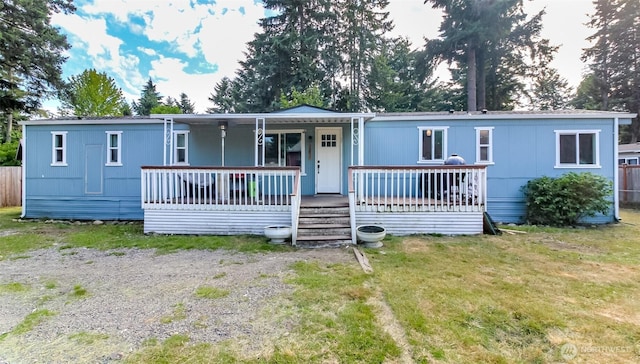 19820 63rd Avenue Ct E, Spanaway, WA 98387 - manufactured / mobile home with a porch