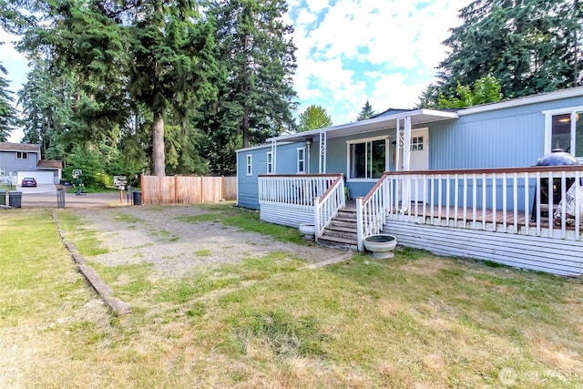 19820 63rd Avenue Ct E, Spanaway, WA 98387 - manufactured / mobile home featuring a porch
