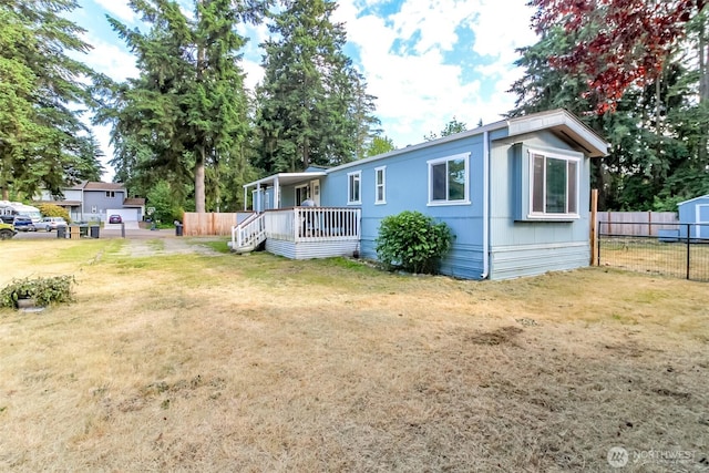 19820 63rd Avenue Ct E, Spanaway, WA 98387 - back of house with a porch