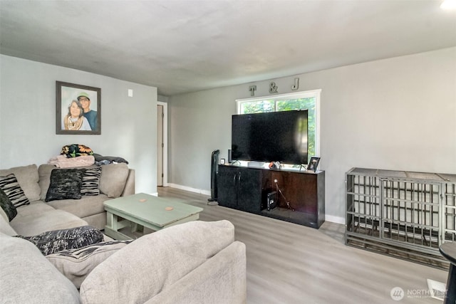 19820 63rd Avenue Ct E, Spanaway, WA 98387 - living area featuring wood finished floors and baseboards