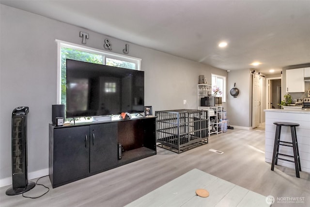 19820 63rd Avenue Ct E, Spanaway, WA 98387 - living room with light wood-style flooring, healthy amount of natural light, and recessed lighting