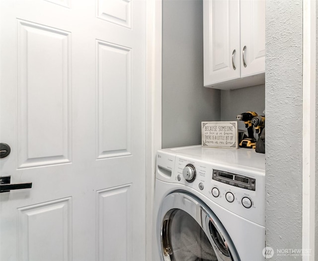 19820 63rd Avenue Ct E, Spanaway, WA 98387 - laundry room with washer / dryer and cabinet space
