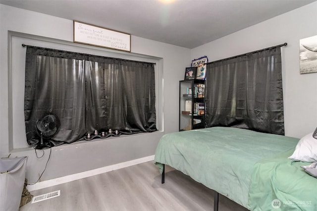 19820 63rd Avenue Ct E, Spanaway, WA 98387 - bedroom featuring wood finished floors and baseboards