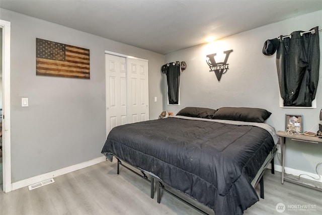 19820 63rd Avenue Ct E, Spanaway, WA 98387 - bedroom featuring wood finished floors and a closet