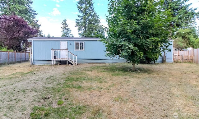 19820 63rd Avenue Ct E, Spanaway, WA 98387 - rear view of house featuring a fenced backyard