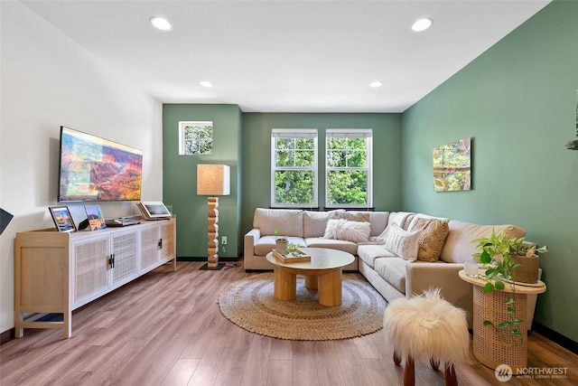 7162 Shinkle Pl SW Unit 64, Seattle, WA 98106 - living room featuring wood finished floors and recessed lighting