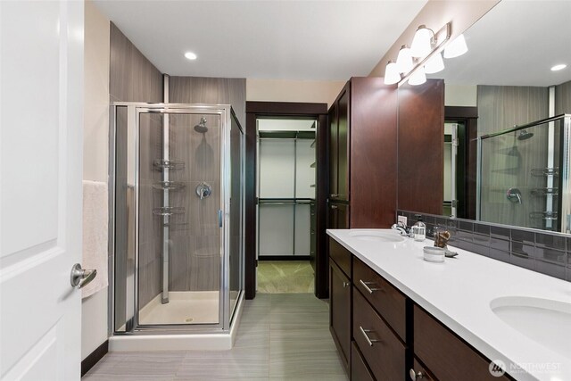 7162 Shinkle Pl SW Unit 64, Seattle, WA 98106 - bathroom featuring a stall shower, tile patterned flooring, double vanity, and recessed lighting