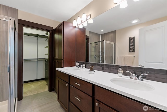 7162 Shinkle Pl SW Unit 64, Seattle, WA 98106 - bathroom with a stall shower and double vanity