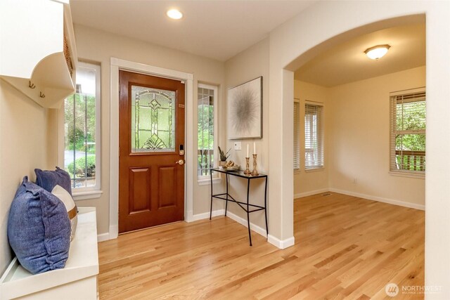 3112 87th Avenue Ct E, Edgewood, WA 98371 - entrance foyer with light wood-type flooring, arched walkways, and recessed lighting