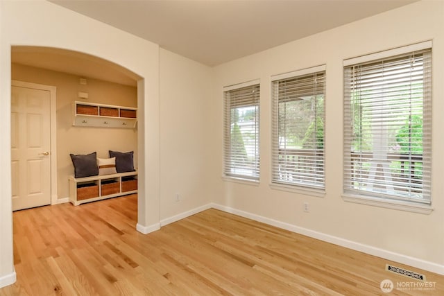 3112 87th Avenue Ct E, Edgewood, WA 98371 - unfurnished bedroom with light wood-style flooring and arched walkways
