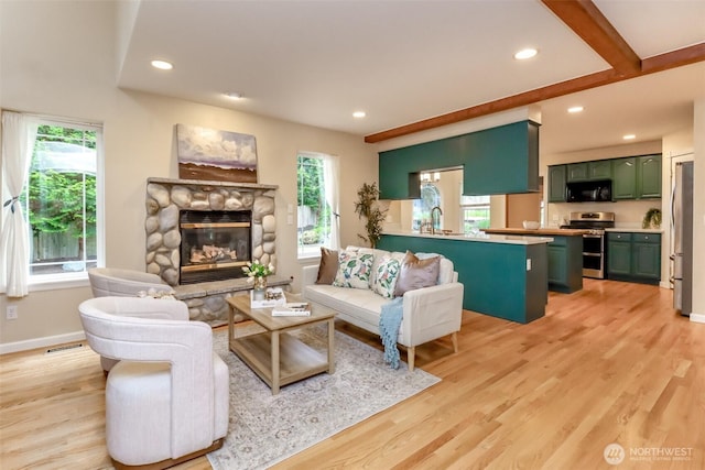 3112 87th Avenue Ct E, Edgewood, WA 98371 - living room with recessed lighting, a fireplace, and light wood finished floors