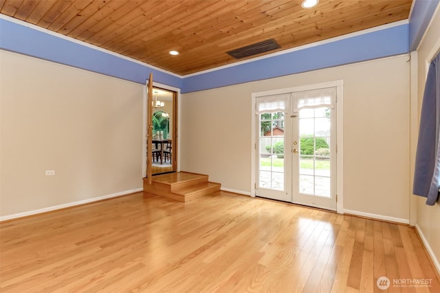 3112 87th Avenue Ct E, Edgewood, WA 98371 - empty room featuring wooden ceiling, french doors, wood finished floors, and recessed lighting