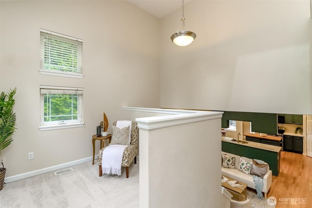 3112 87th Avenue Ct E, Edgewood, WA 98371 - sitting room featuring baseboards and lofted ceiling