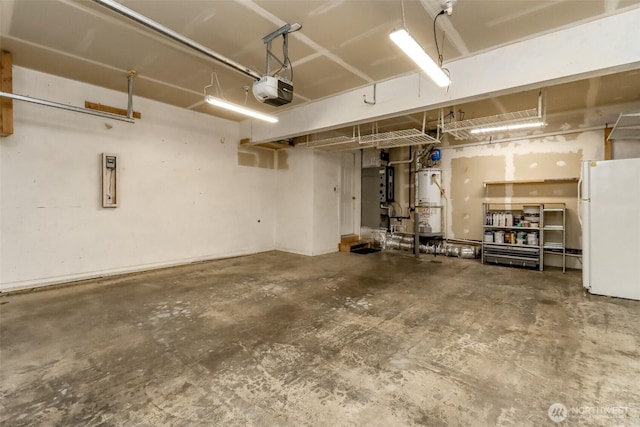 3112 87th Avenue Ct E, Edgewood, WA 98371 - garage featuring freestanding refrigerator, water heater, and a garage door opener