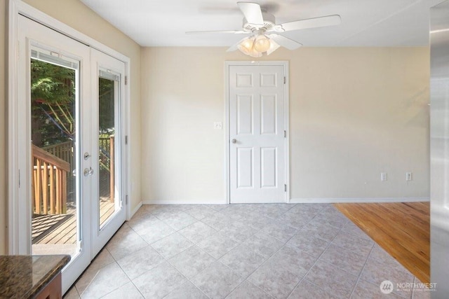 16204 Corliss Pl N, Shoreline, WA 98133 - spare room with ceiling fan, light tile patterned flooring, and french doors