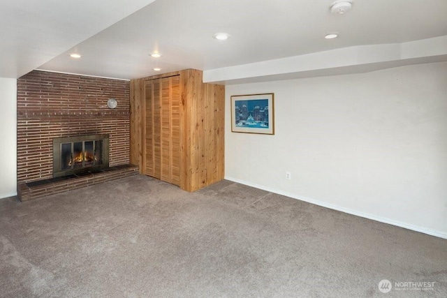 16204 Corliss Pl N, Shoreline, WA 98133 - unfurnished living room featuring carpet floors, a fireplace, and recessed lighting