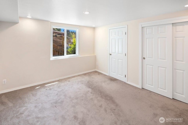 16204 Corliss Pl N, Shoreline, WA 98133 - unfurnished bedroom featuring carpet floors and recessed lighting
