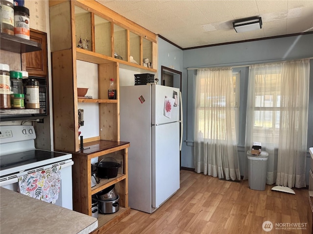 8 S Main St, Curlew, WA 99118 - kitchen with white appliances, open shelves, and light wood finished floors