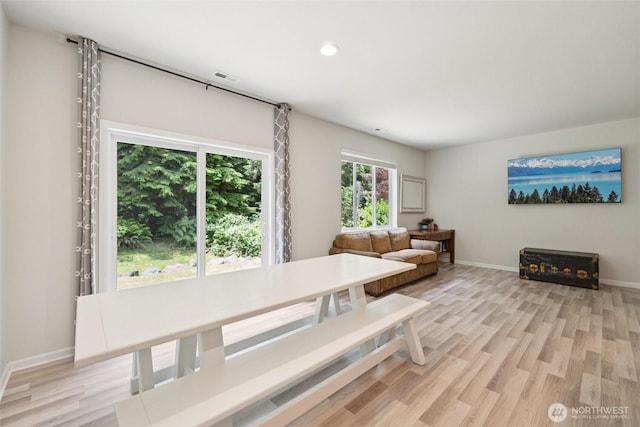 7608 16th Pl SE, Lake Stevens, WA 98258 - dining room with light wood-type flooring and recessed lighting