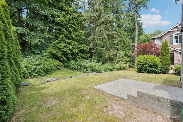 7608 16th Pl SE, Lake Stevens, WA 98258 - view of green lawn featuring a patio