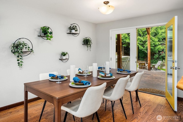 409 169th St SE, Bothell, WA 98012 - dining space with light wood-type flooring and french doors