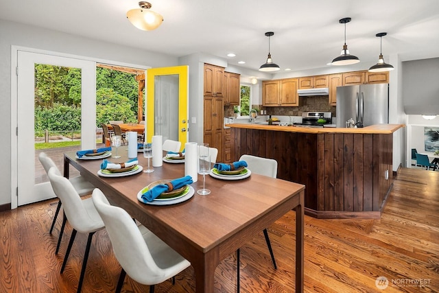 409 169th St SE, Bothell, WA 98012 - dining space featuring light wood-style floors, plenty of natural light, and recessed lighting