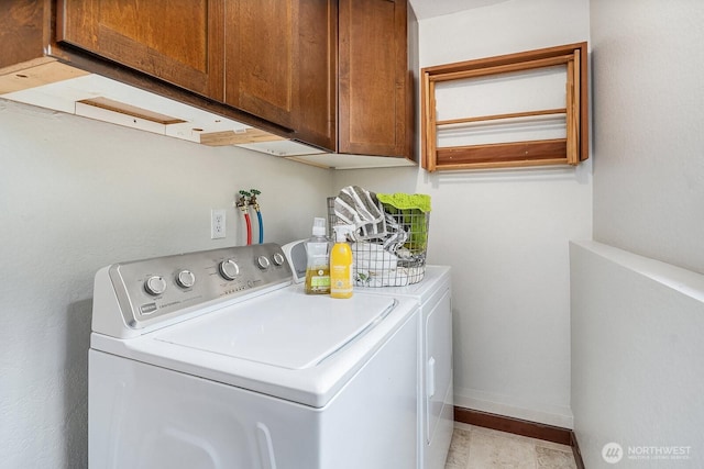 409 169th St SE, Bothell, WA 98012 - laundry area with washing machine and clothes dryer and cabinet space