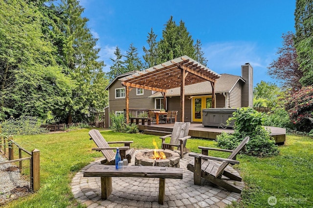 409 169th St SE, Bothell, WA 98012 - back of house featuring a hot tub, a fire pit, a pergola, a deck, and a chimney