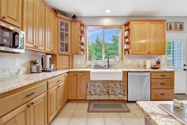 21414 137th Ave NE, Arlington, WA 98223 - kitchen featuring stainless steel appliances, open shelves, light tile patterned floors, light stone countertops, and recessed lighting