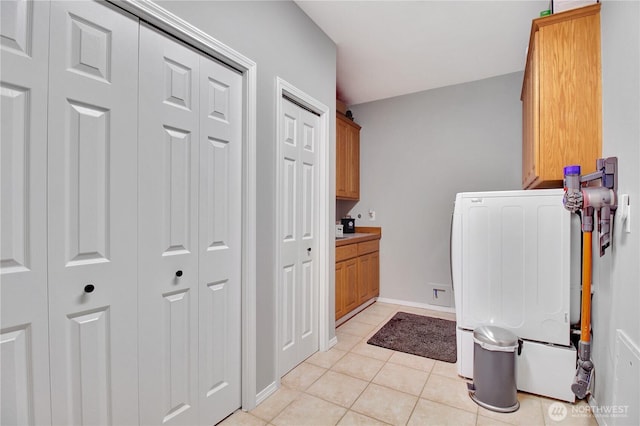 21414 137th Ave NE, Arlington, WA 98223 - washroom with cabinet space and light tile patterned flooring