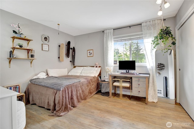 21414 137th Ave NE, Arlington, WA 98223 - bedroom featuring light wood-type flooring