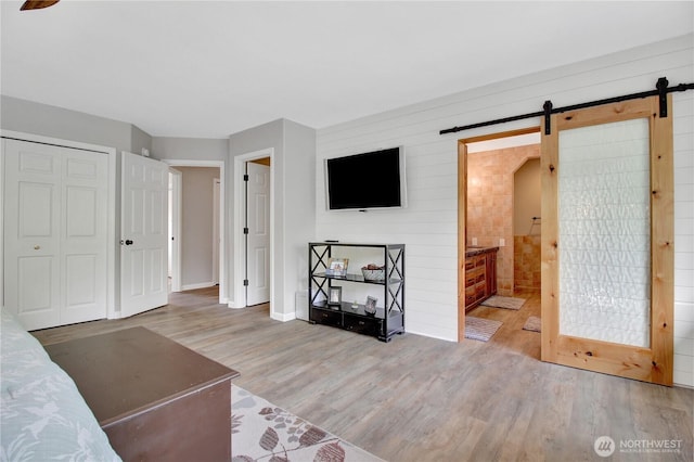 21414 137th Ave NE, Arlington, WA 98223 - living area with wood finished floors and a barn door