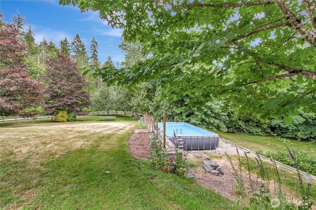 21414 137th Ave NE, Arlington, WA 98223 - view of green lawn with an outdoor pool