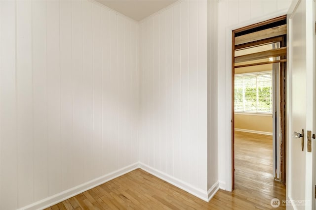 6711 100th St SW, Lakewood, WA 98499 - unfurnished room with light wood-style floors and ornamental molding