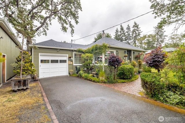 6711 100th St SW, Lakewood, WA 98499 - single story home featuring asphalt driveway, an attached garage, a chimney, and roof with shingles