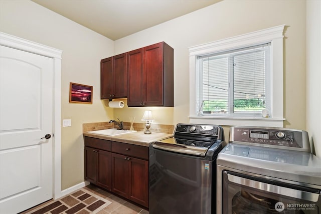 26713 178th Loop SE, Covington, WA 98042 - washroom featuring independent washer and dryer and cabinet space