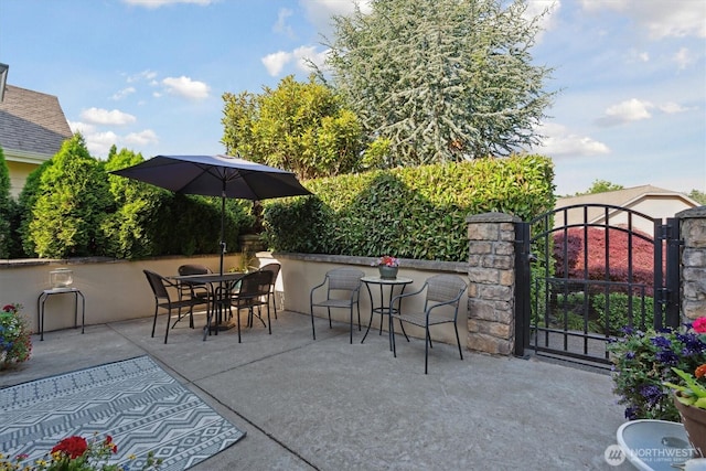 26713 178th Loop SE, Covington, WA 98042 - view of patio / terrace with a gate