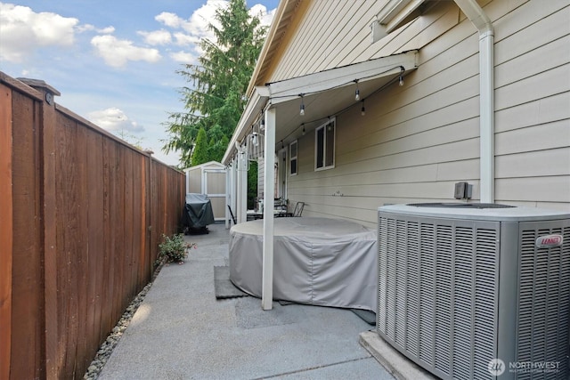26713 178th Loop SE, Covington, WA 98042 - view of patio with a storage unit and area for grilling