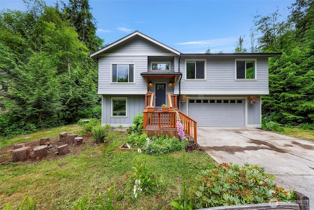 3 River Ridge Loop, Bellingham, WA 98229 - split foyer home featuring an attached garage, driveway, and board and batten siding
