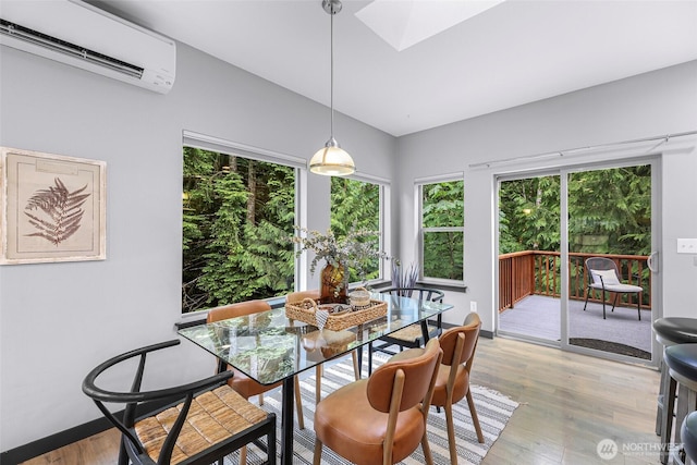 3 River Ridge Loop, Bellingham, WA 98229 - dining area with a wall mounted air conditioner, plenty of natural light, light wood-style floors, and a skylight
