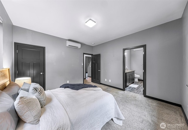 3 River Ridge Loop, Bellingham, WA 98229 - bedroom featuring a wall unit AC, light colored carpet, and ensuite bath