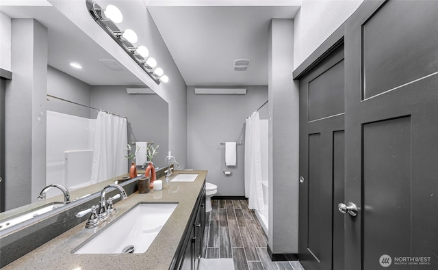 3 River Ridge Loop, Bellingham, WA 98229 - bathroom with double vanity, wood tiled floors, and shower / bath combo
