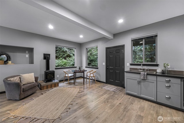 3 River Ridge Loop, Bellingham, WA 98229 - living room featuring a wood stove, light wood-style flooring, and recessed lighting