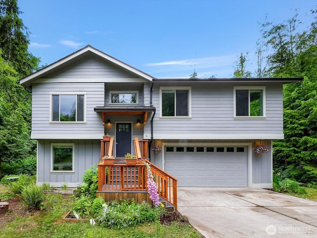 3 River Ridge Loop, Bellingham, WA 98229 - split foyer home with an attached garage, driveway, and board and batten siding