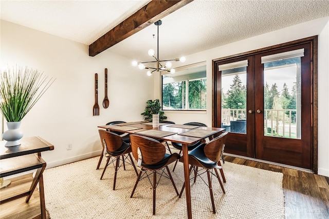830 S 301st Pl, Federal Way, WA 98003 - dining space featuring french doors, wood finished floors, a chandelier, and beamed ceiling