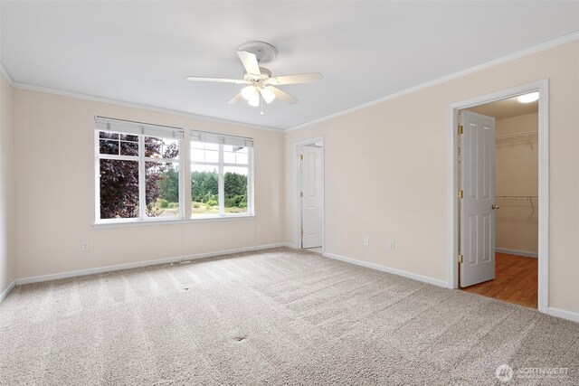 22019 84th Avenue Ct E, Graham, WA 98338 - unfurnished room featuring carpet, ornamental molding, and a ceiling fan