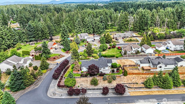 22019 84th Avenue Ct E, Graham, WA 98338 - aerial view of residential area with a forest and a mountainous background