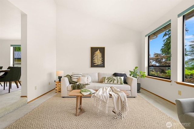 1708 Whatcom St, Bellingham, WA 98229 - carpeted living room with baseboards and vaulted ceiling