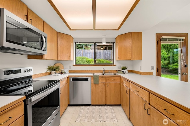 1708 Whatcom St, Bellingham, WA 98229 - kitchen with stainless steel appliances, light countertops, and plenty of natural light