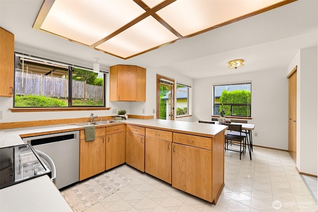 1708 Whatcom St, Bellingham, WA 98229 - kitchen featuring dishwasher, a peninsula, light countertops, and black / electric stove